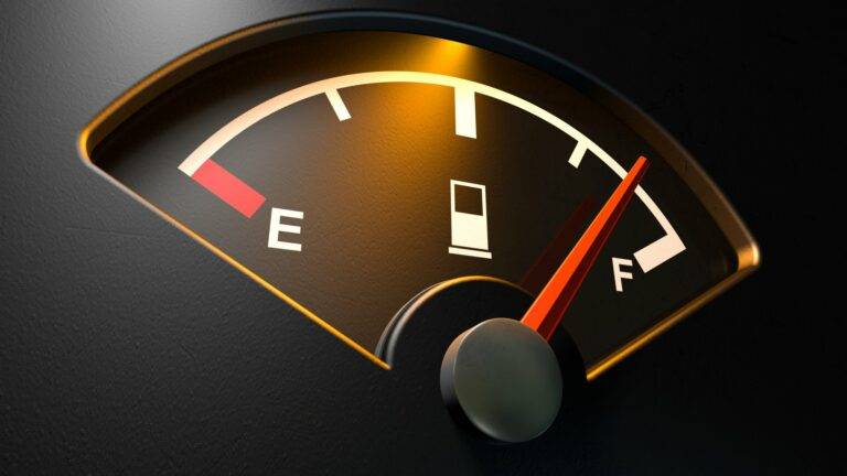 Fuel gauge with the needle pointing to full, indicating a full tank.