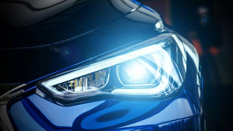 Close-up of a car's illuminated LED headlight.